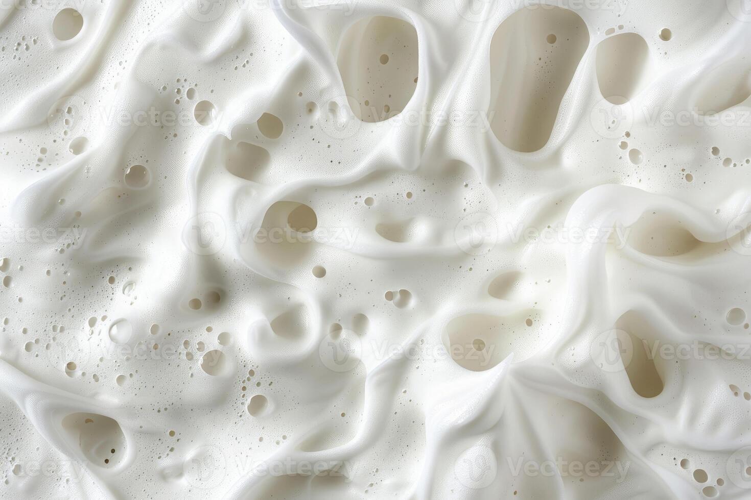 White foam texture background with bubbles forming abstract pattern photo
