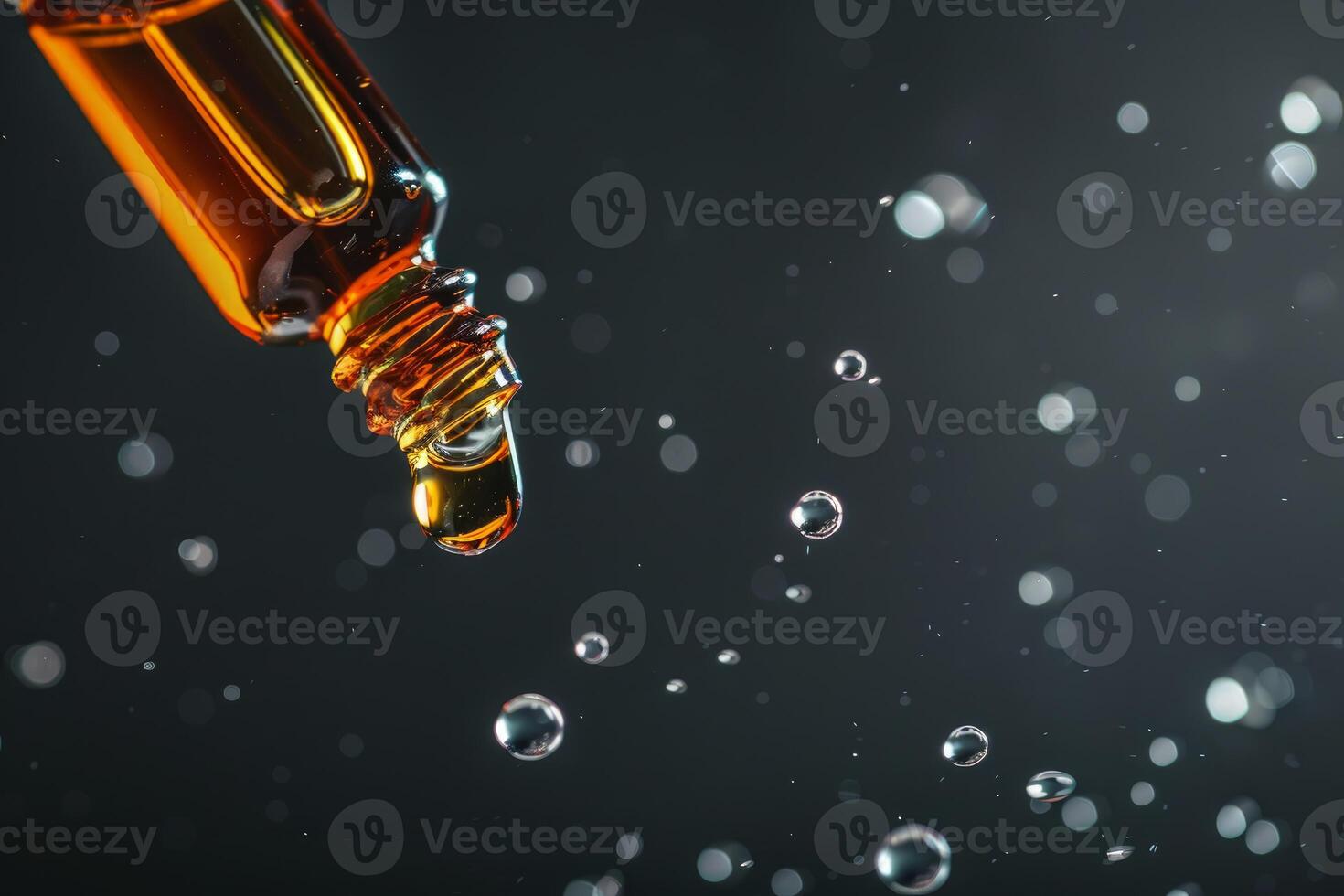 Pipette dropping oil product with bokeh effect on black background photo