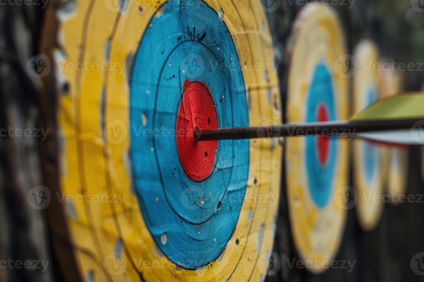 Archery arrow hitting the center of target during competition photo