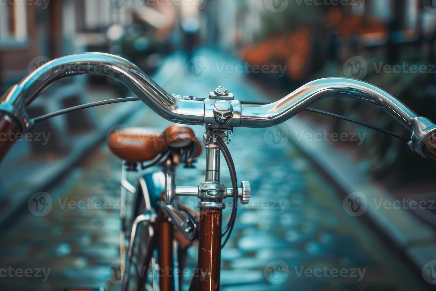 Shiny chrome handlebars taking in the city on a bicycle ride photo