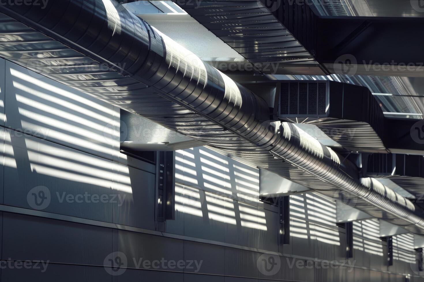 Ventilation system creating interesting light pattern on wall photo