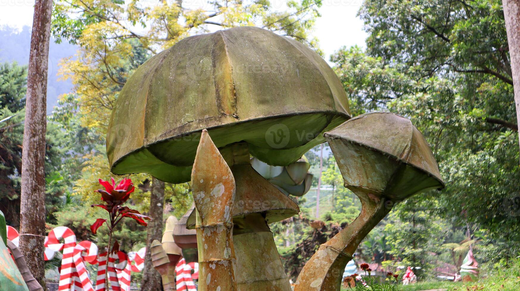 giant mushroom statue in the Wonderpark Tawangmangu tourist area, Indonesia photo