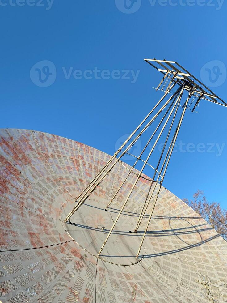 Close-up of old radio telescope, used to study centimeter range of radio waves photo
