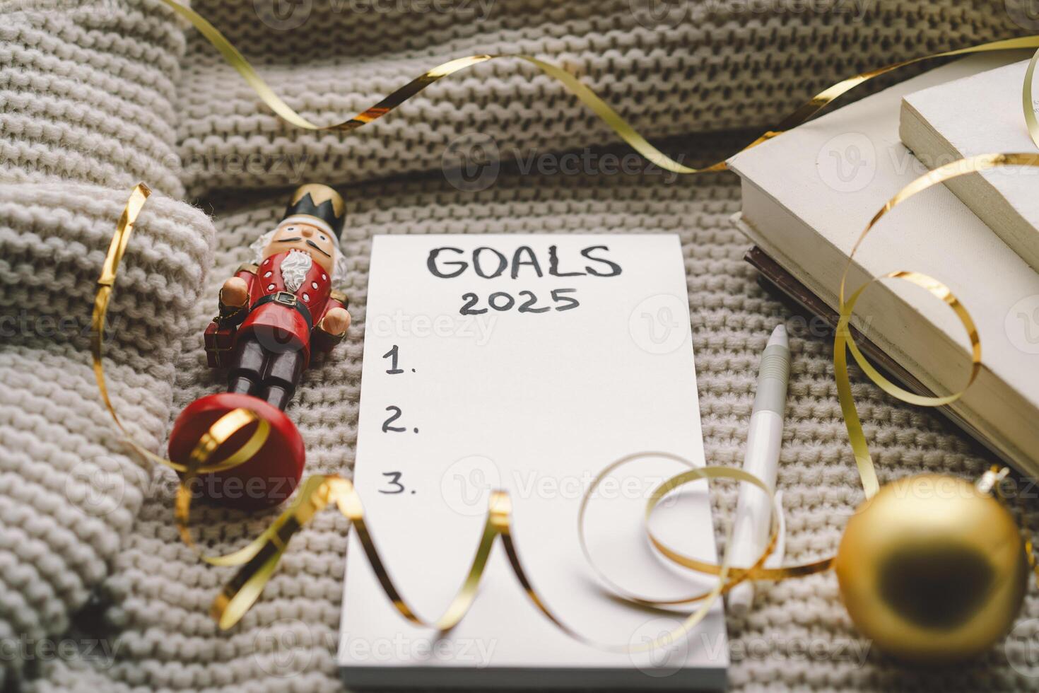 Setting New Year's goals with cozy vibes and festive decorations in preparation for 2025 photo
