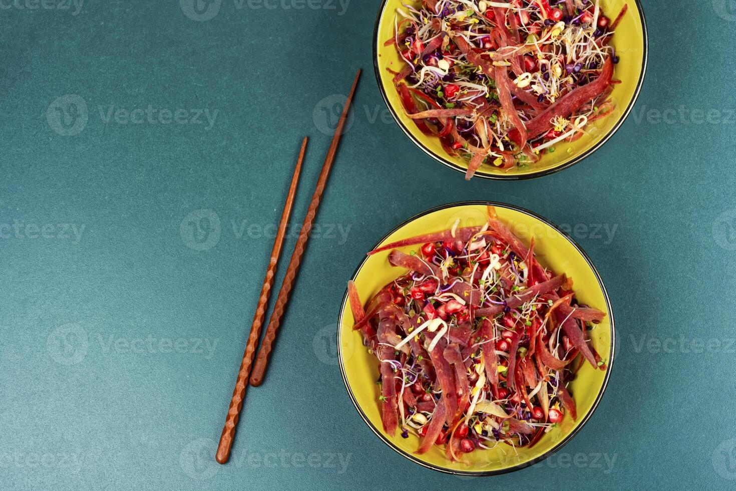 Healthy salad with sprouts and lettuce. photo