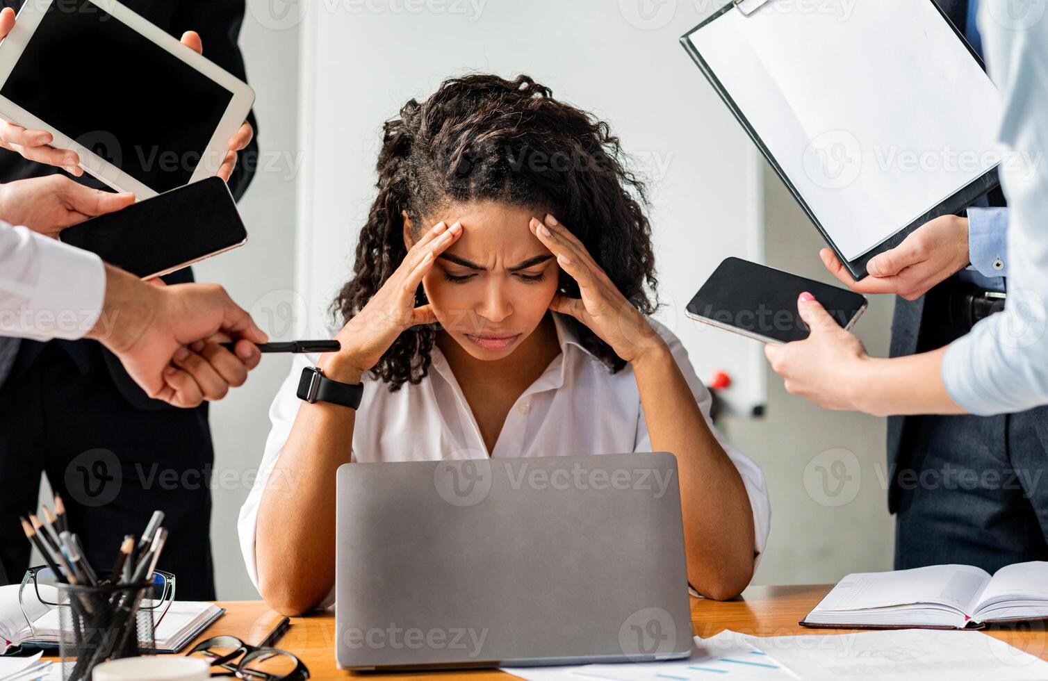 Multitasking. Overworked Business Lady Sitting Stressed By A Lot Of Tasks At Work In Modern Office. photo