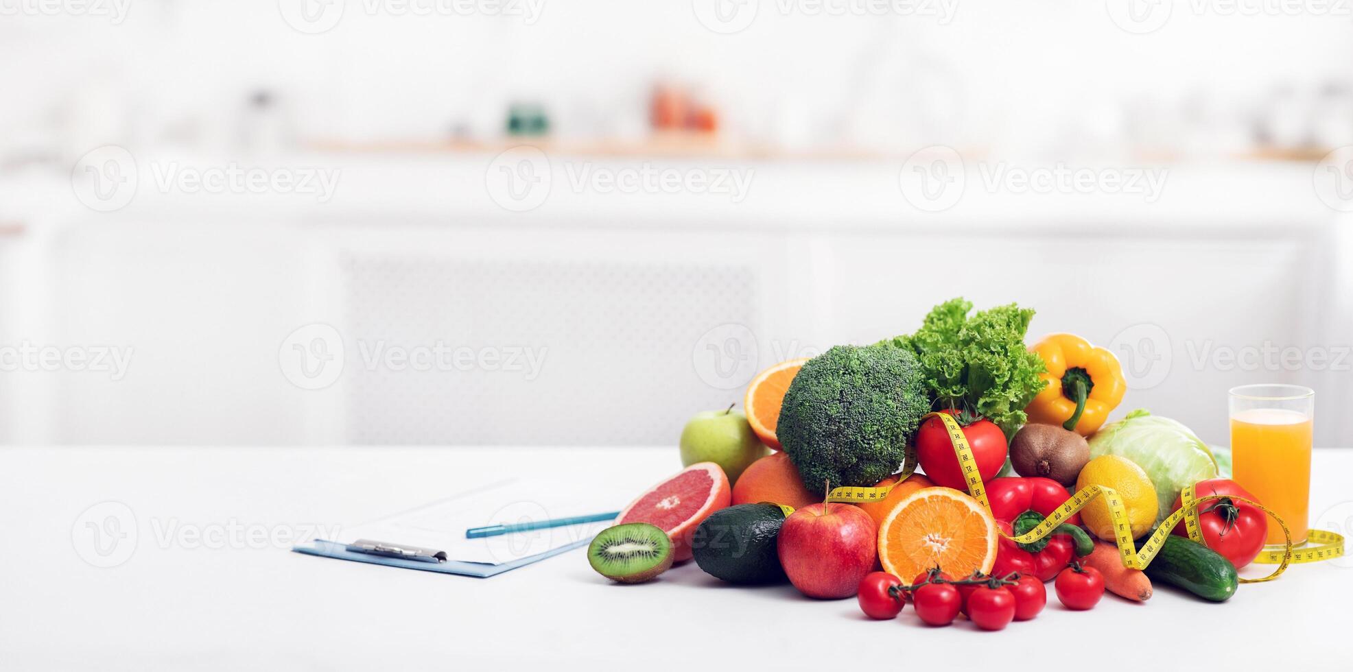 Nutritionist's empty workplace with fruits, vegetables, measuring tape and medical chart on table, panorama with copy space photo