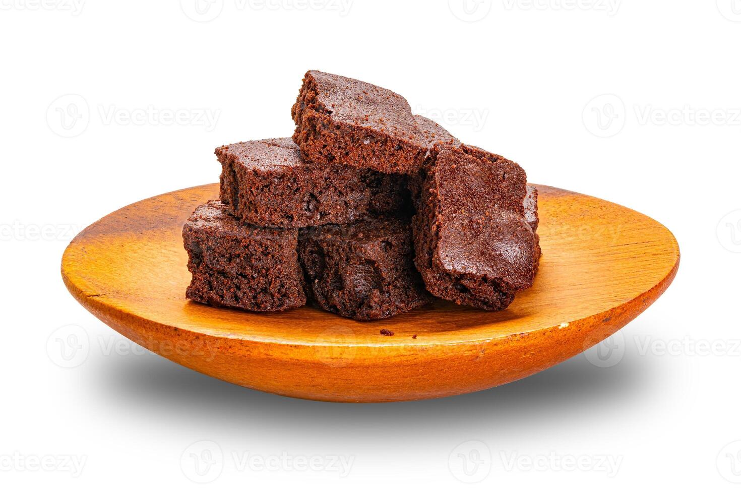 Pile of crispy brownie chocolate cube in wooden dish isolated on white background with clipping path. photo