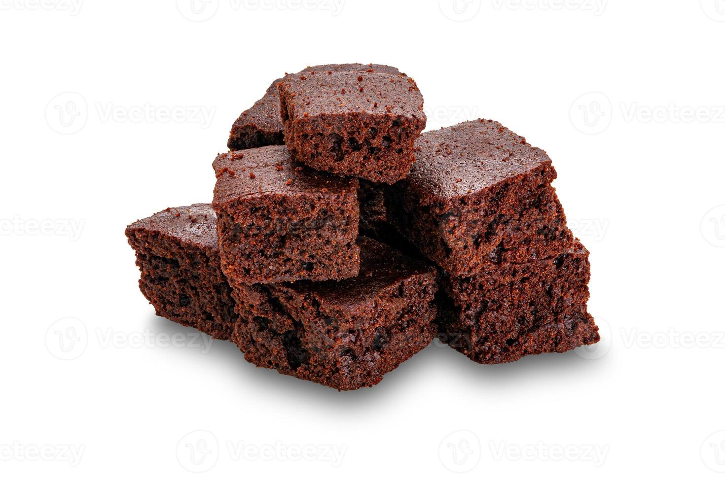 Pile of sweet crispy brownie chocolate cube isolated on white background with clipping path. photo