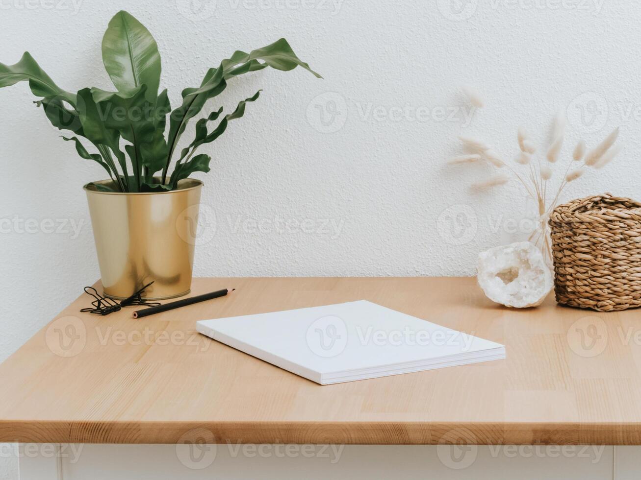Home office wood desk with home decor amd various accessories photo