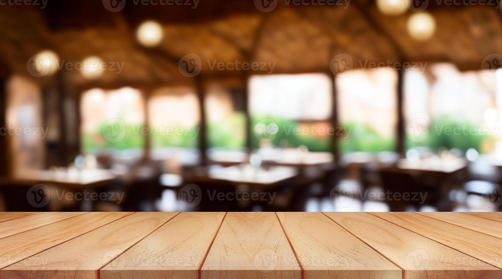 Empty wooden table top with lights bokeh on blur restaurant background. photo