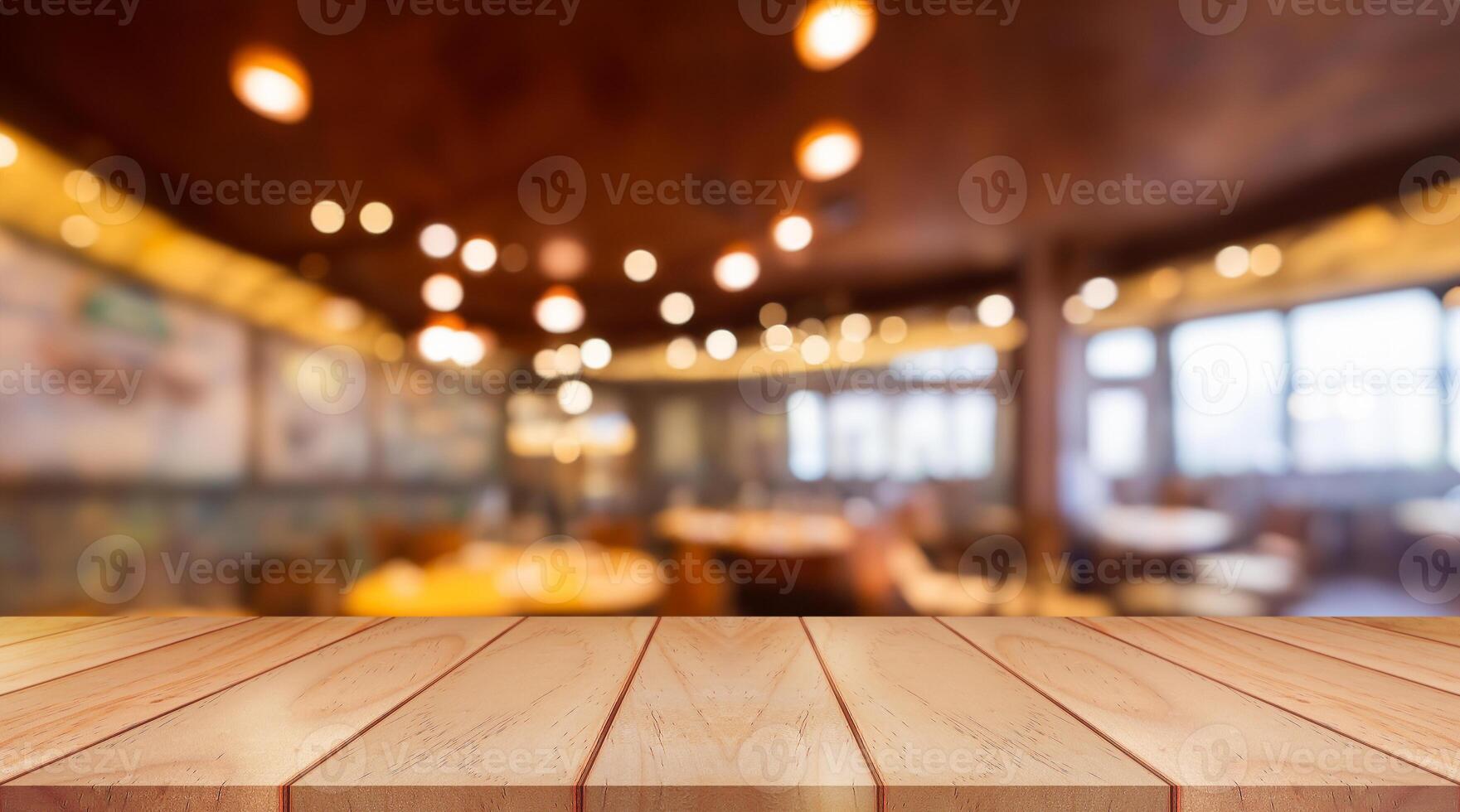 Empty wooden table top with lights bokeh on blur restaurant background. photo