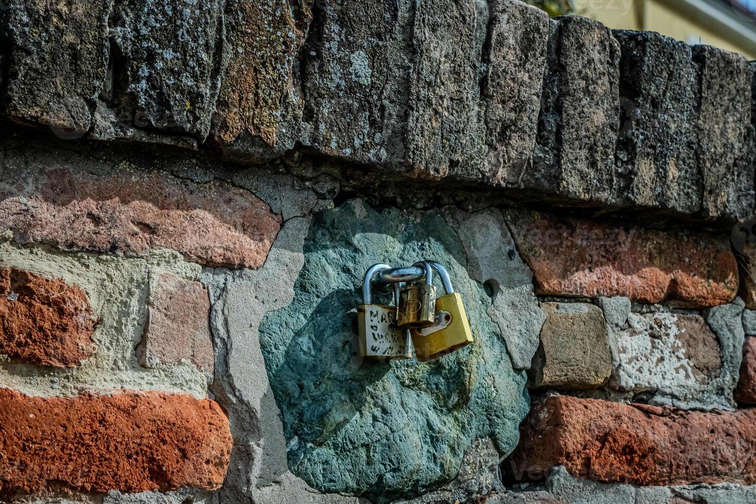 The fortress perched on Petrovaradin Hill watches over the city, while the charming streets and modern buildings of Novi Sad are spread out, creating a perfect blend of history and contemporary life photo