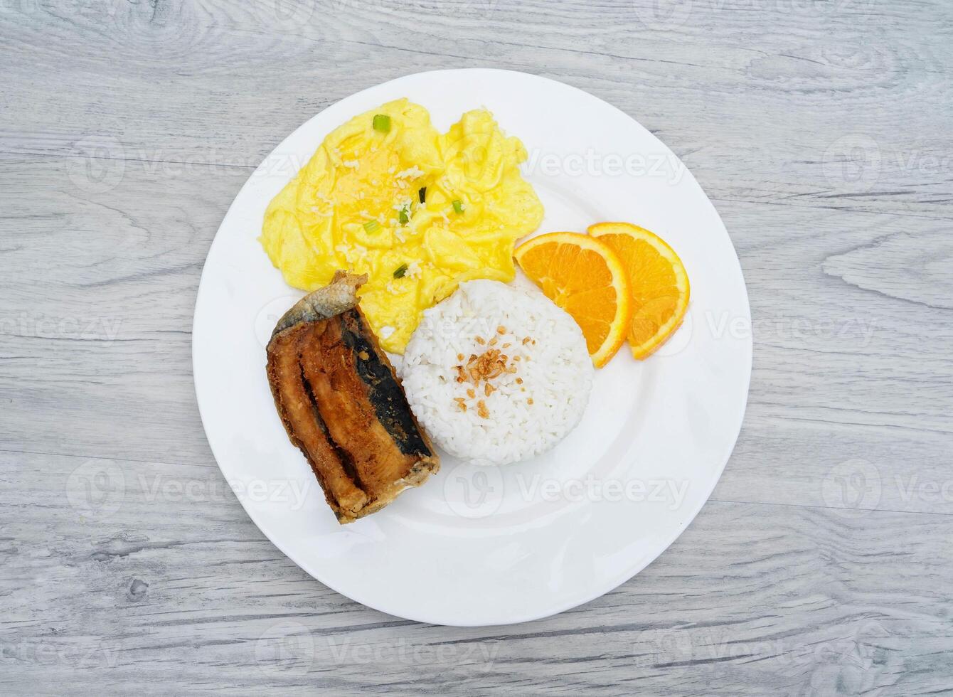 Fried Milkfish with Rice and Scrambled Eggs photo