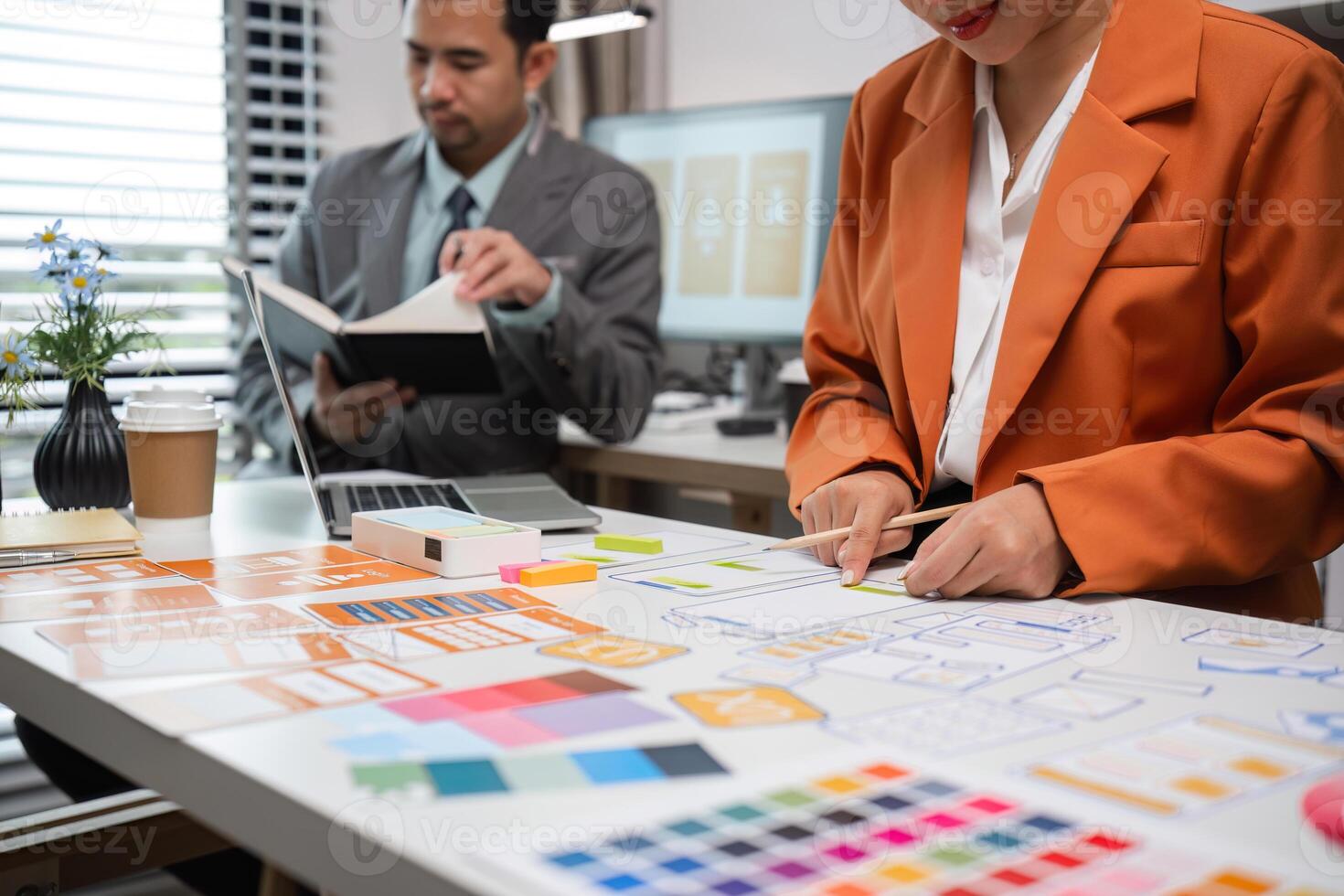 Program Developer Team Collaborates on UXUI Design in Modern Office Setting photo