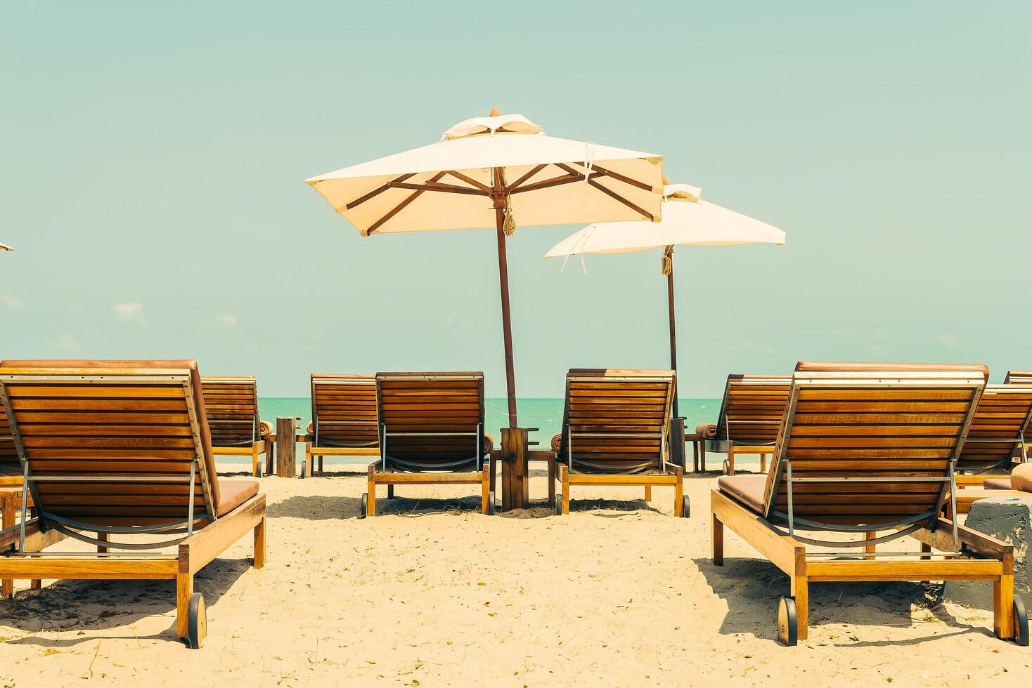 Beach chairs and umbrellas on the beach photo