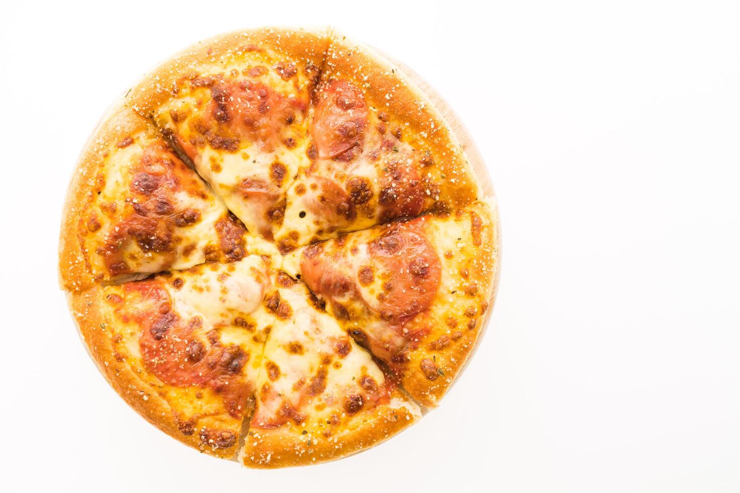A pizza with cheese and pepperoni on a white background photo