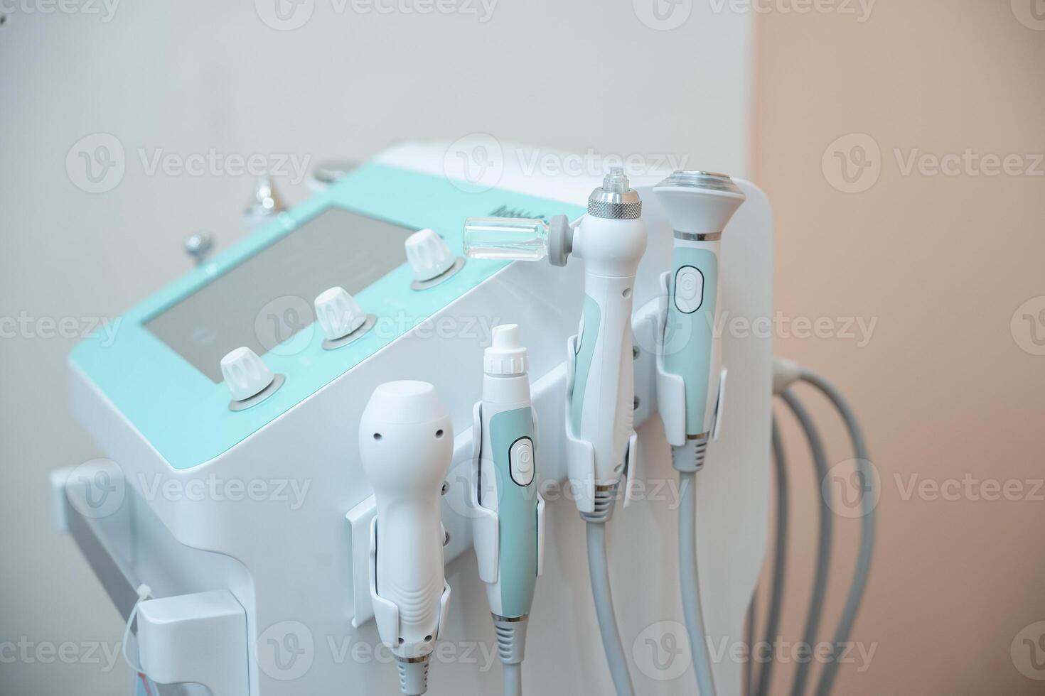 Ultrasound facial beauty treatment equipment in the beauty salon. photo
