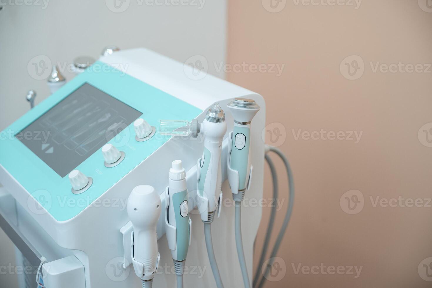 Ultrasound facial beauty treatment equipment in the beauty salon. photo