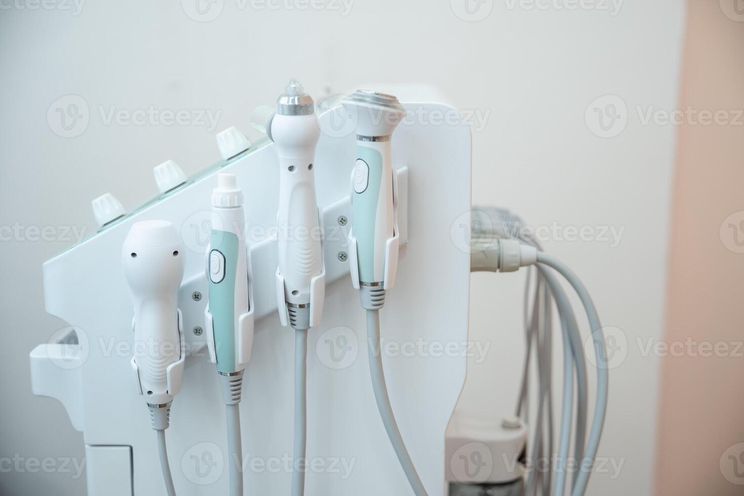 Ultrasound facial beauty treatment equipment in the beauty salon. photo