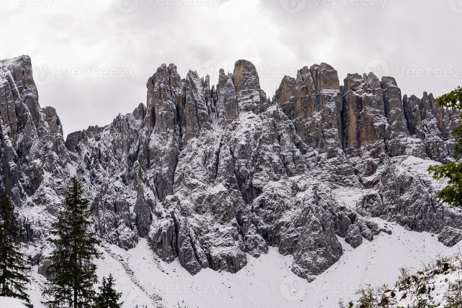 Mountain peaks at Karersee in Dolomites Italy. photo