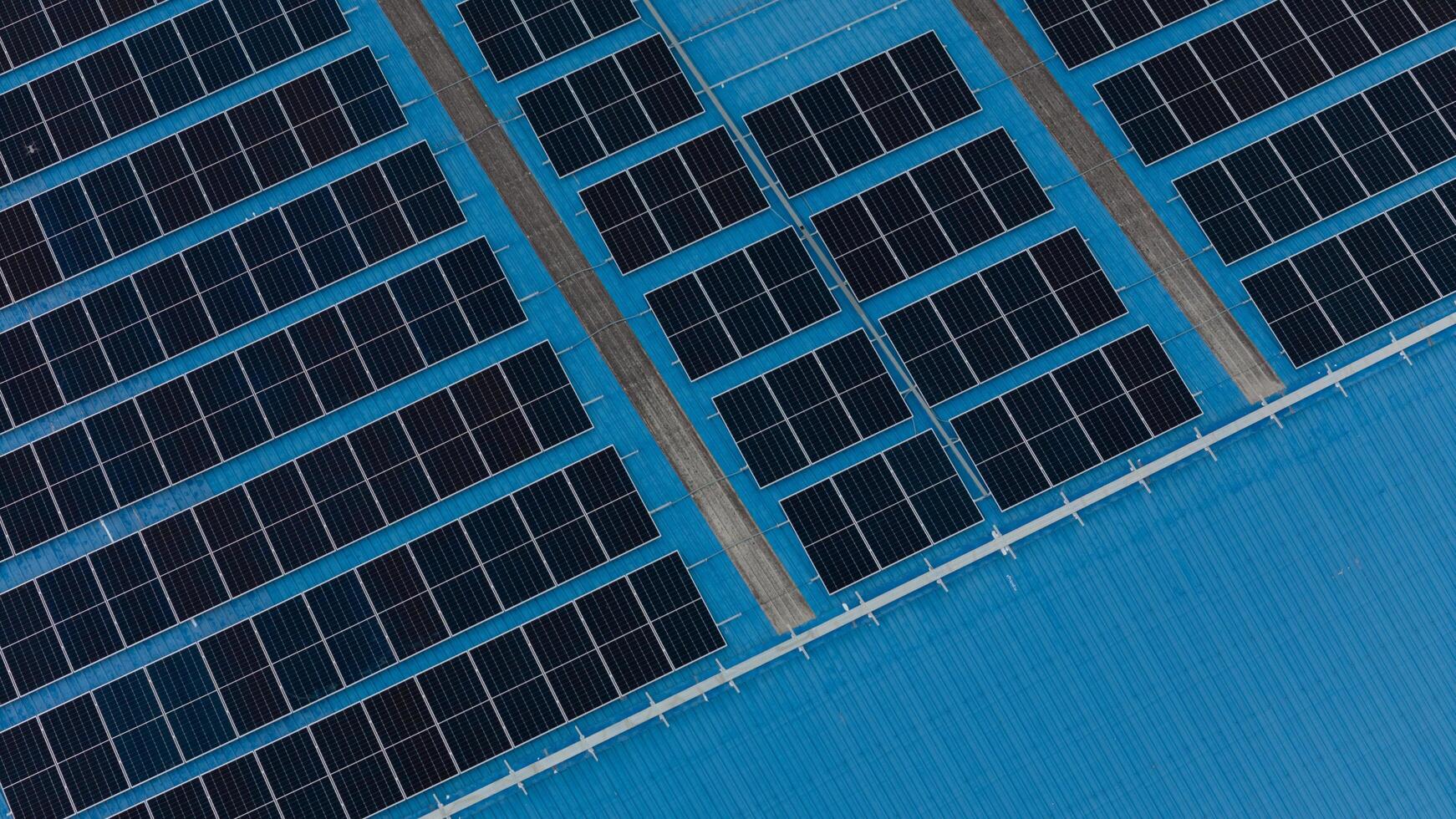 Solar Panel. Solar photovoltaic panel system in Industry roof. Saving Energy with Clean Power. photo