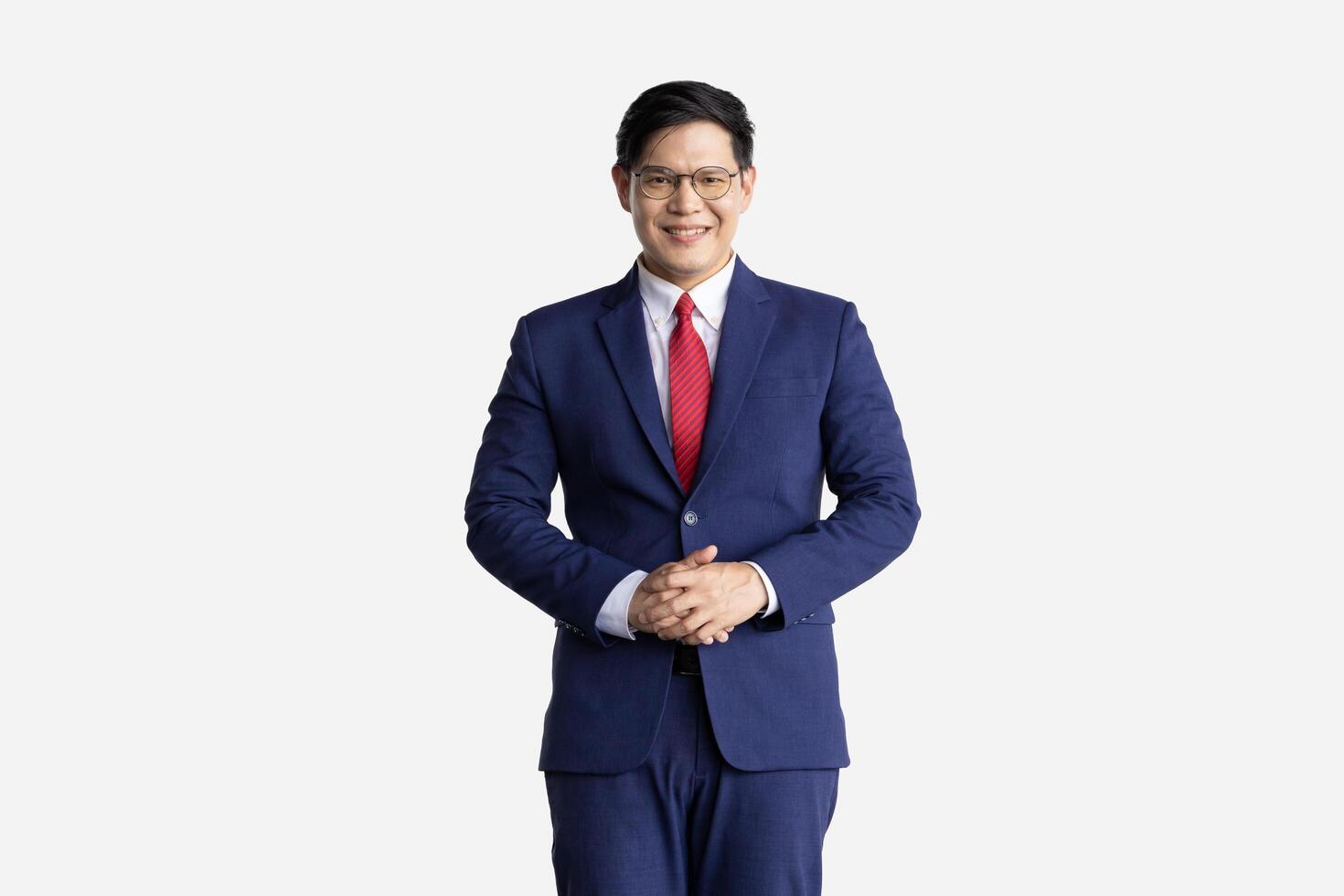 Reception Asian model isolated on white background. Receptionist male in business suit expression standing welcome smile photo