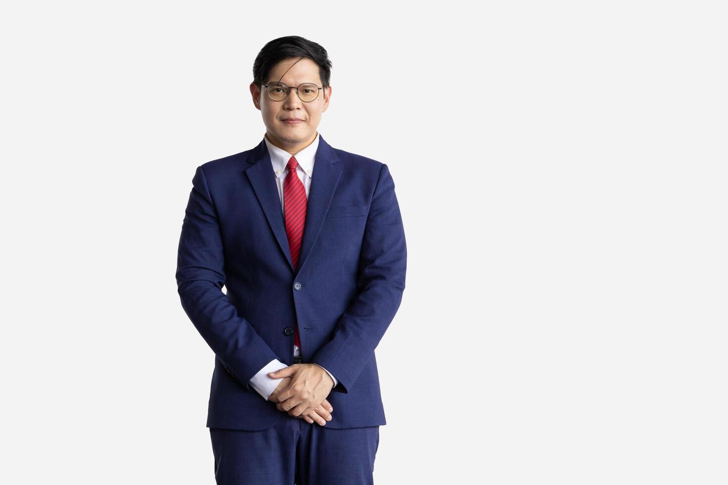 Reception Asian model isolated on white background. Receptionist male in business suit expression standing welcome smile photo