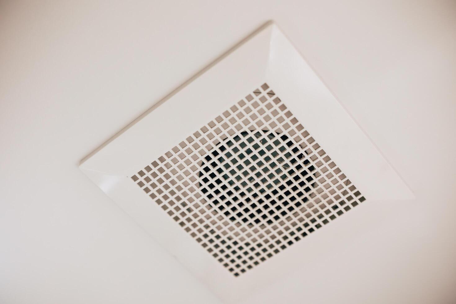 ceiling mount duct ventilation fan, air ventilator grill in bath room for eliminate humidity and bad smell photo