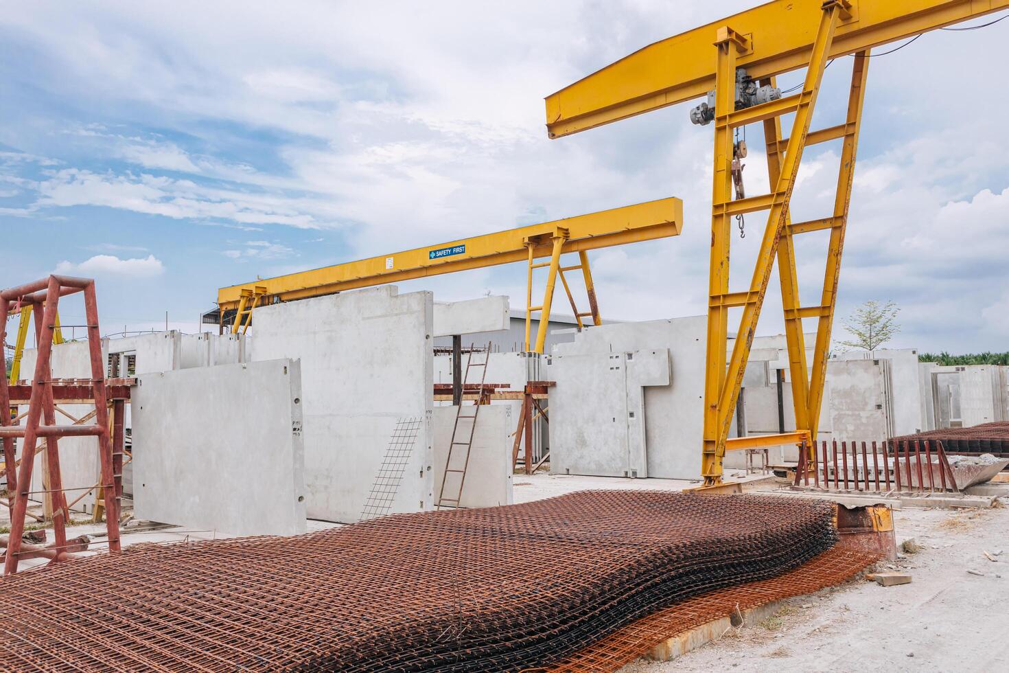 Precast concrete casting manufacturing plant, Cement products large construction site yard business industry. photo