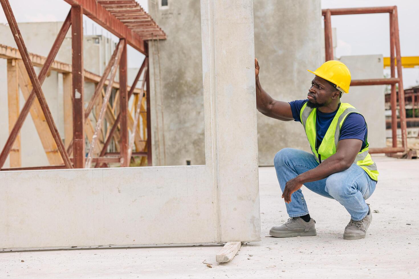 African black engineer worker working in Precast concrete casting manufacturing checking product quality standard outdoor construction site photo