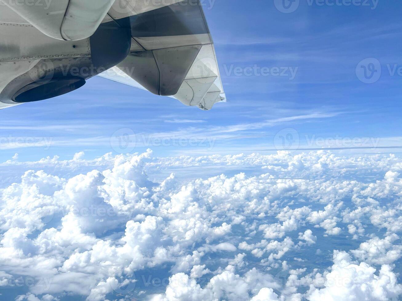 High nature view large white clouds on soft sky background in the morning, View of white cloudy on the plane. photo