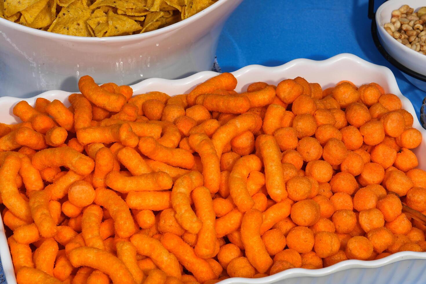 a bowl of orange cheetos photo