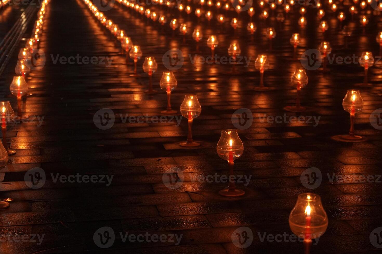 A large number of candles are lit for Vesak Day ceremony in Borobudur Temple. photo
