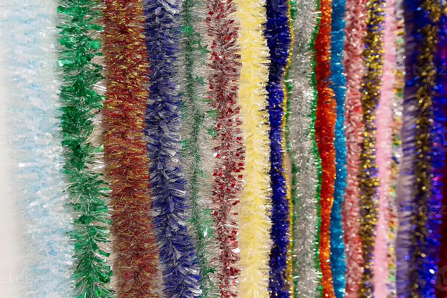 Varicoloured decorative ornaments for Christmas on a store window photo