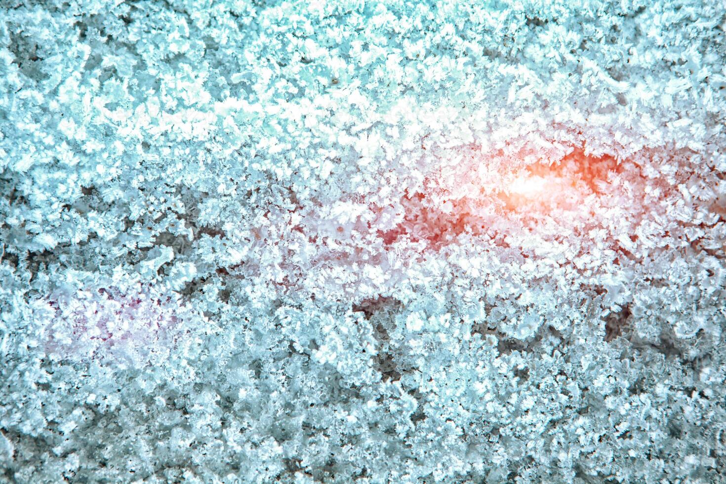 frost texture. frozen ice on the grass. winter hoarfrost background photo
