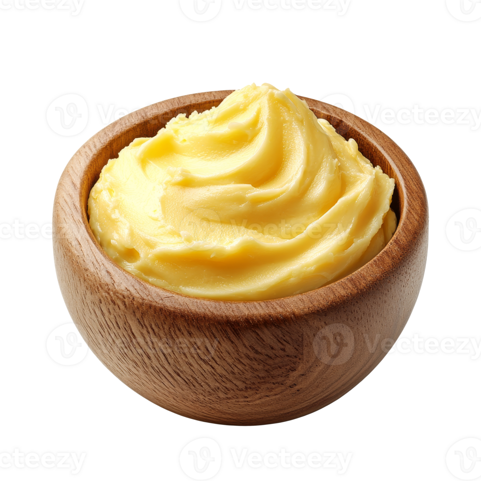 Creamy butter in a wooden bowl ready for use isolated transparent png
