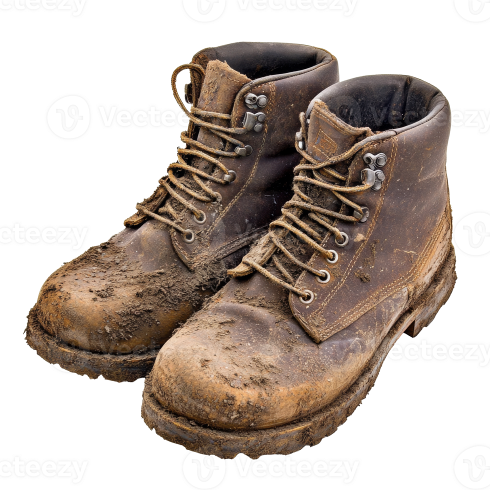 Worn brown work boots covered in mud and dirt transparent png