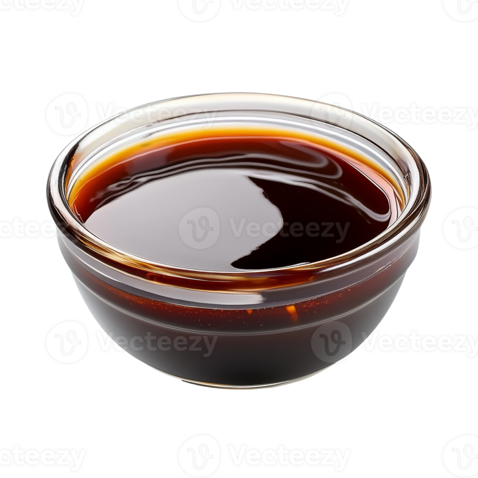 Small bowl of dark sauce on table png