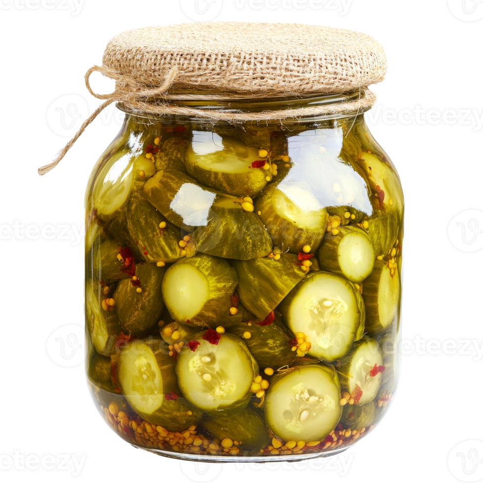 Homemade dill pickles in a glass jar on display png