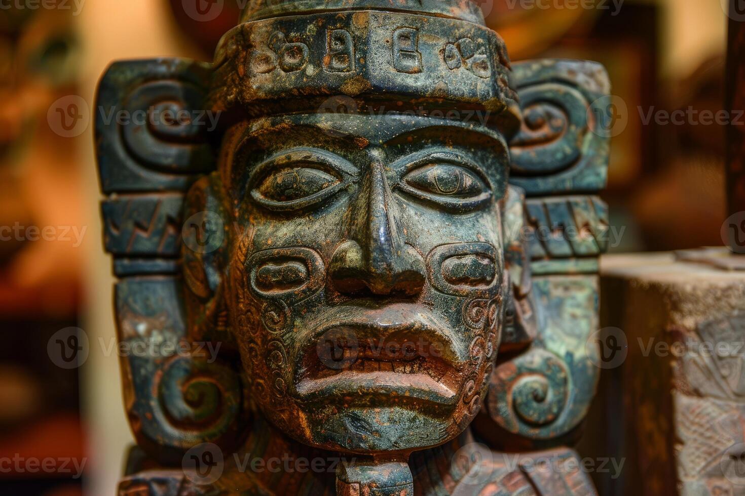 Ancient mayan statue depicting deity with elaborate headdress photo