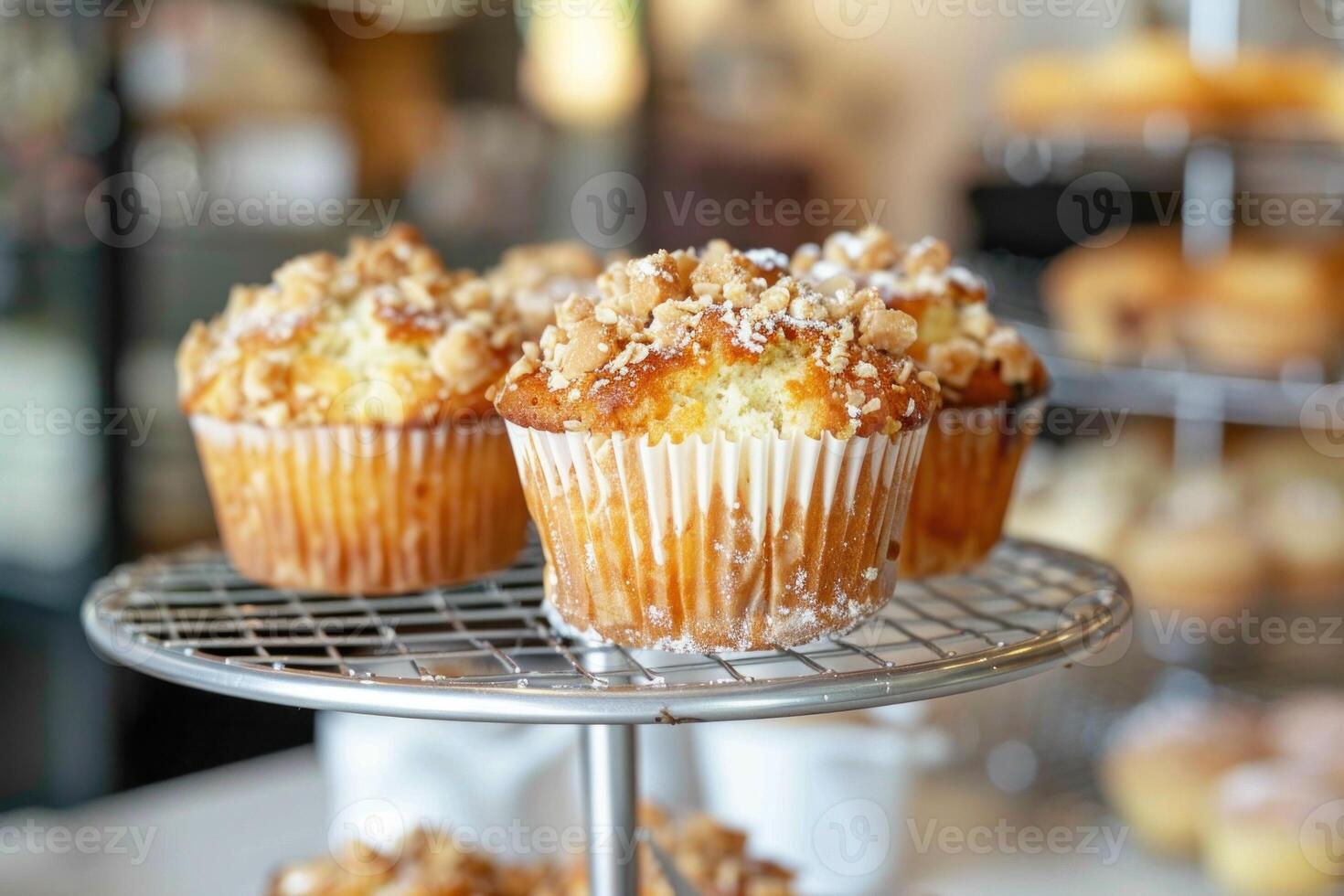 Delicious muffins cooling on a rack in bakery display photo