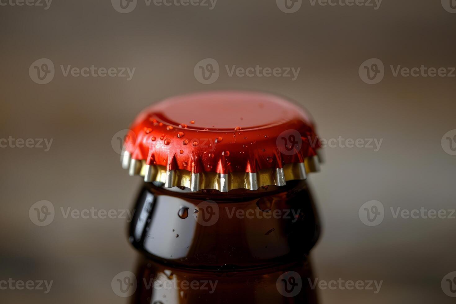 Close up of wet bottle cap on glass beer bottle photo