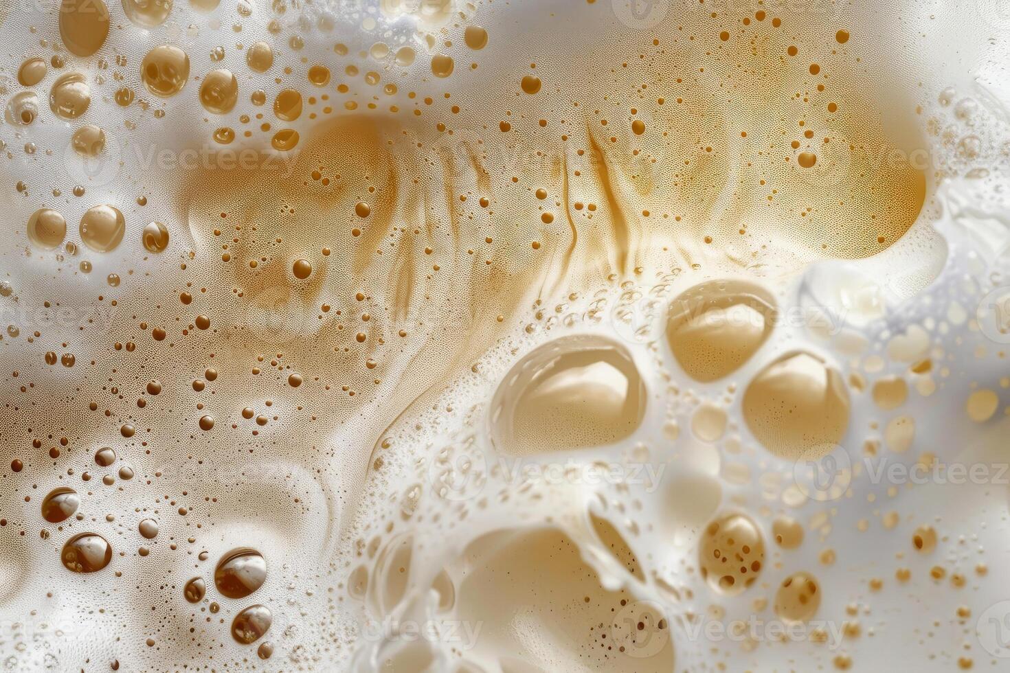 Closeup of beer bubbles forming a smooth surface photo