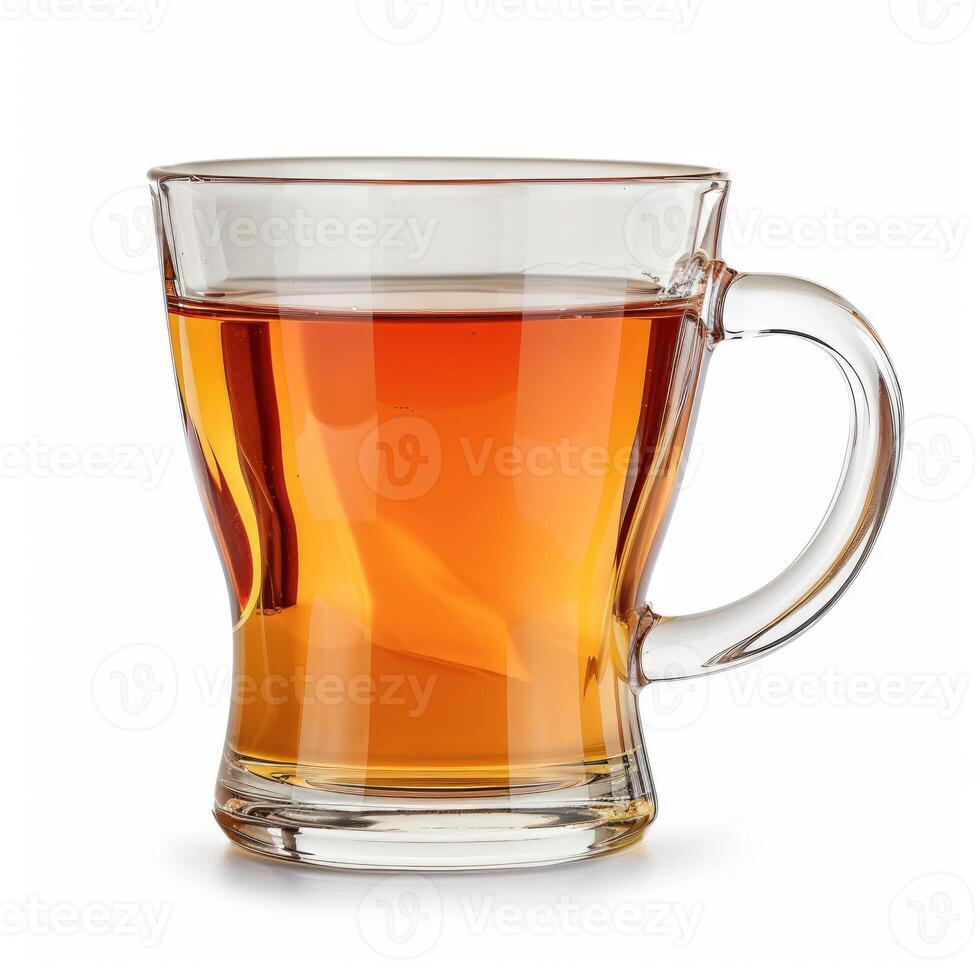 Clear glass cup containing hot tea with a teabag steeping inside photo