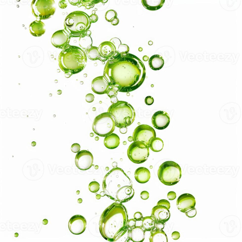 Green bubbles rising on a white background creating abstract pattern photo