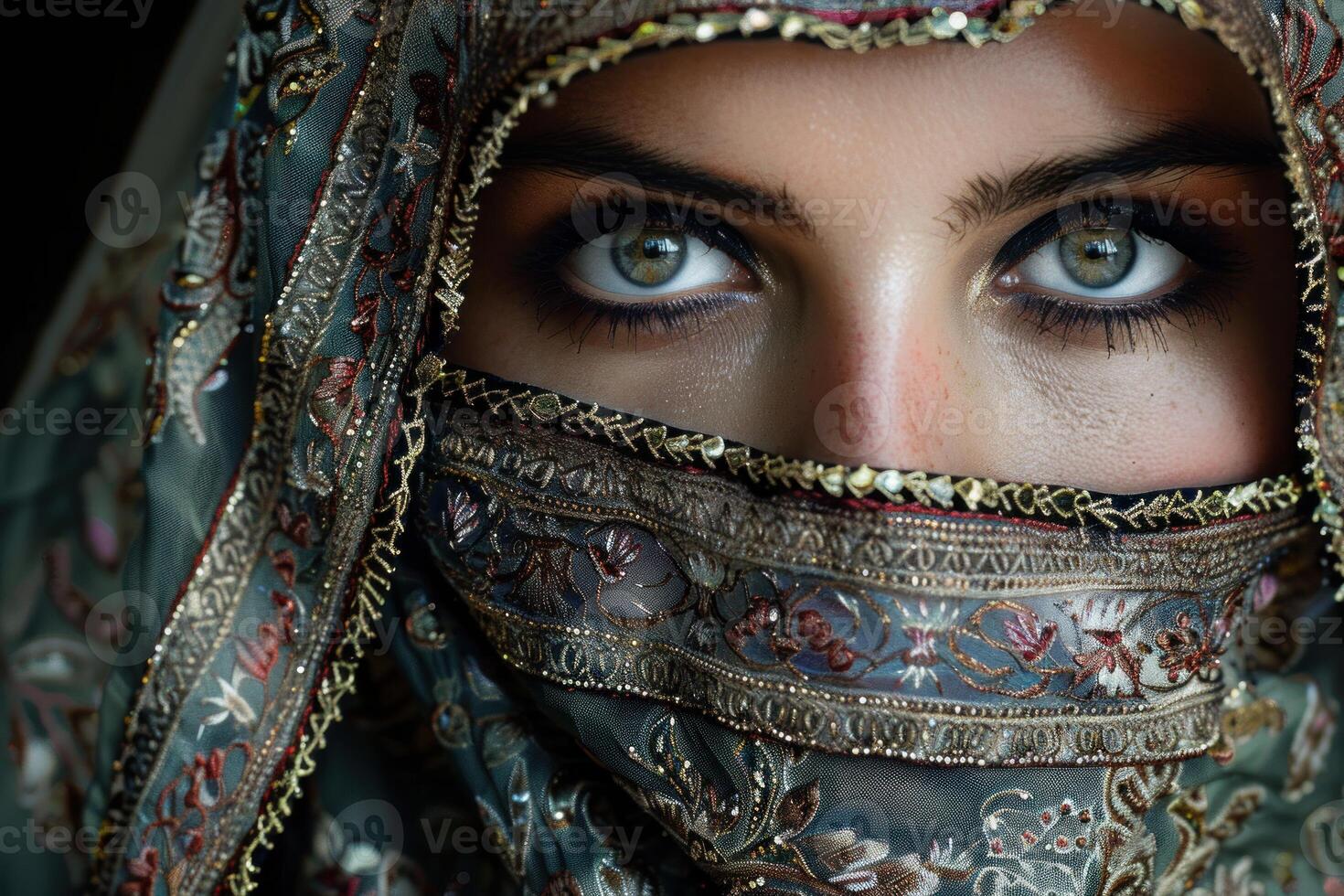 Middle eastern woman wearing niqab showing her beautiful eyes photo