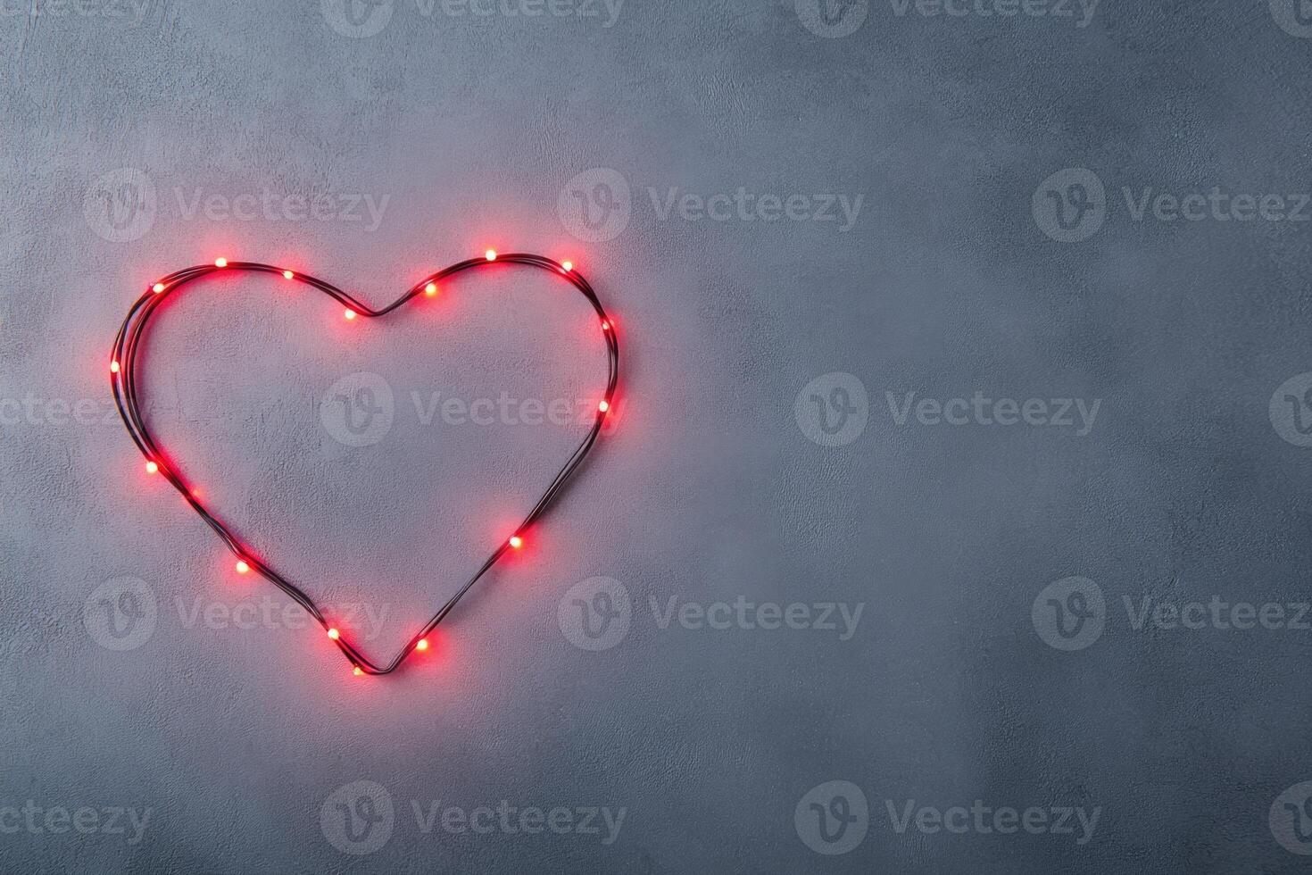 heart shape glowing frame . photo