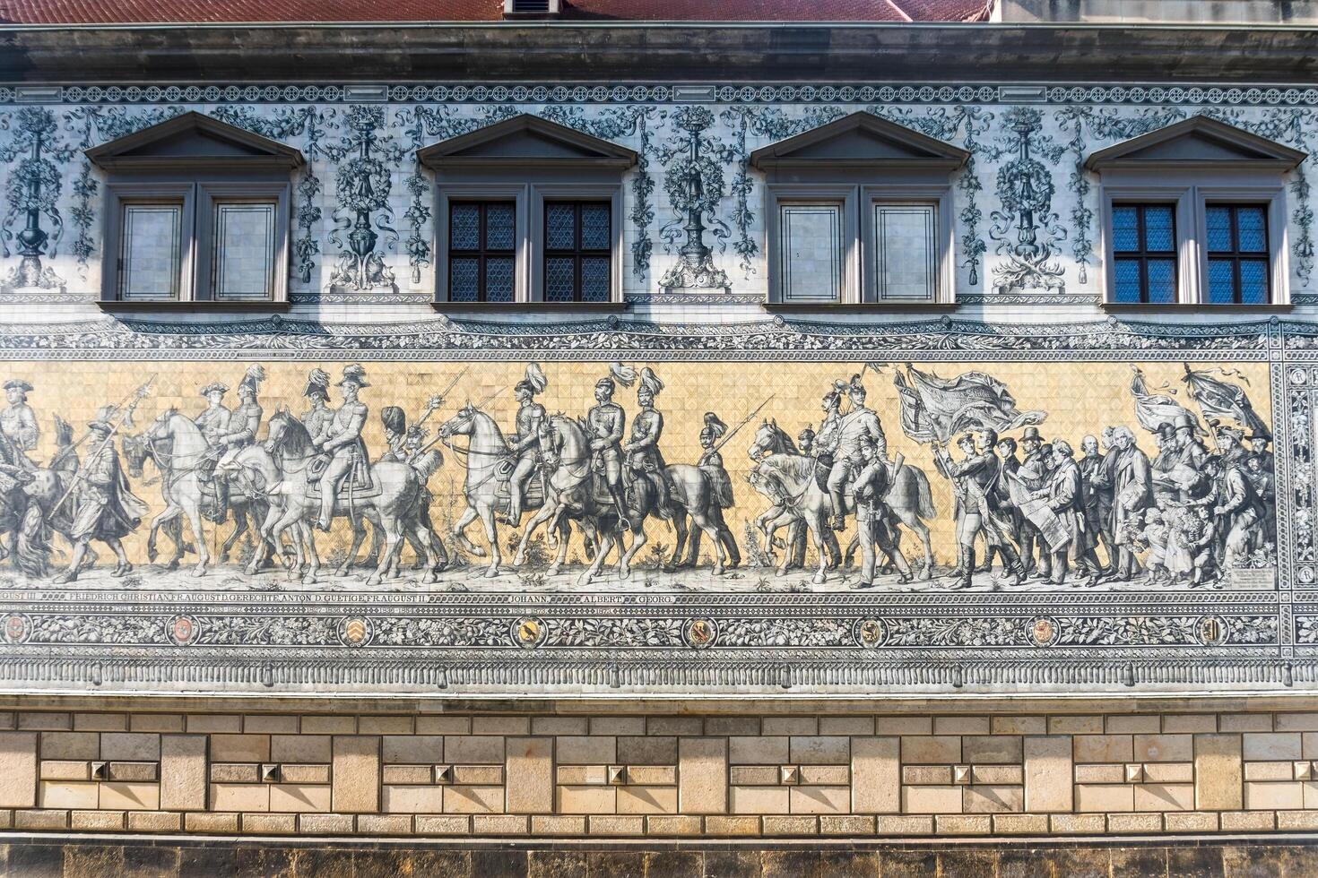 Dresden, Germany-august 15, 2022-view of the Furstenzug a long and fantastic mural in porcelain tiles depicting the Saxon rulers in various eras. photo