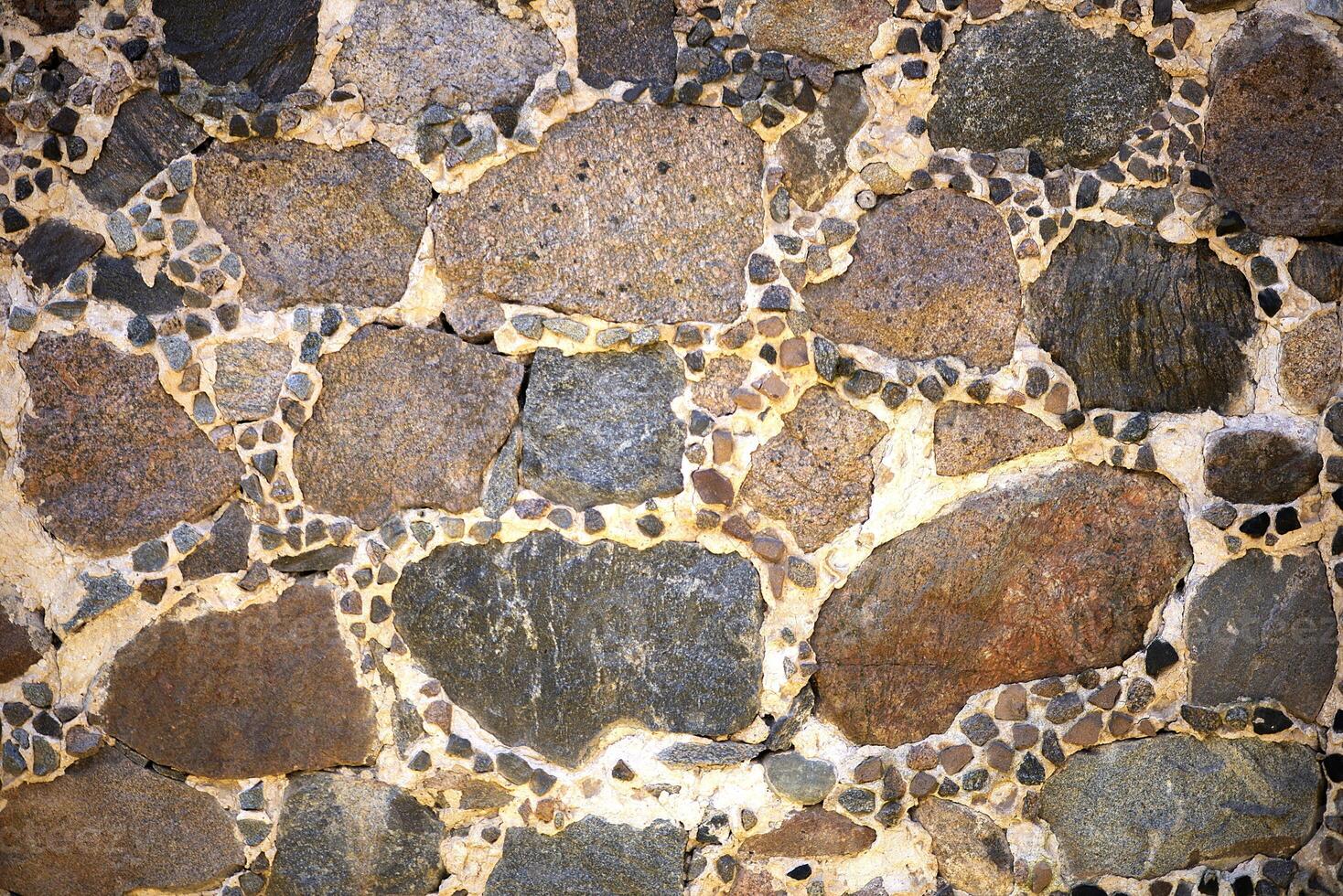 Texture of a stone wall. Old castle stone wall texture background. Stone wall as a background or texture. photo
